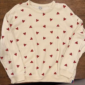 KULE The Oversized Allover Heart Sweatshirt